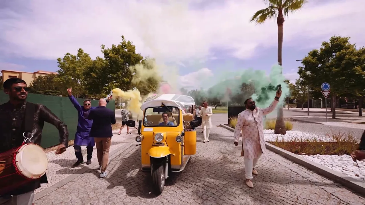 Baraat with smoke and a tuk-tuk at Anantara Vilamoura, wedding film by VIP Weddings Films